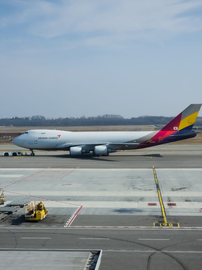 Cargo plane on airport tarmac - air freight logistics